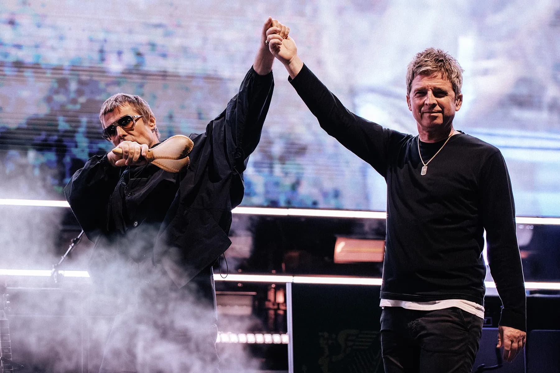 Liam and Noel Gallagher on stage together, Oasis Live ’25